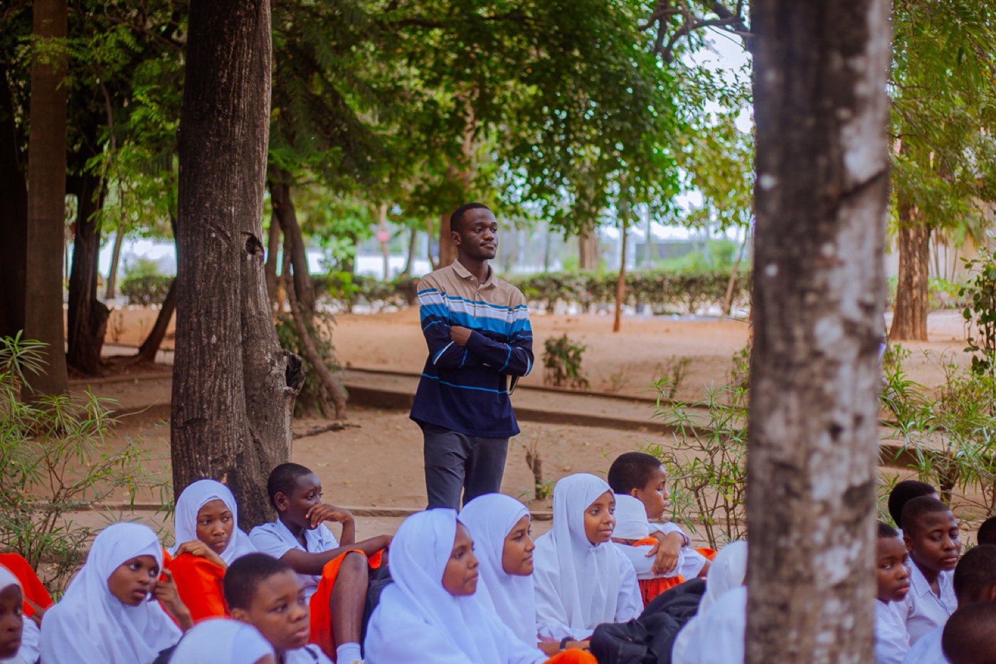 A GROW team member listens closely during the outreach session